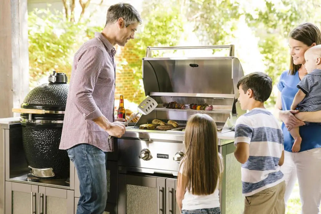 Family Cooking on a Coyote Gas Grill