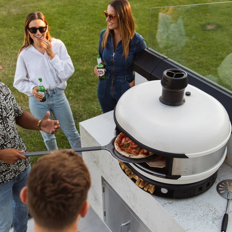 Gozney Dome Pizza Oven W/ People Gathered Around - Lifestyle Image